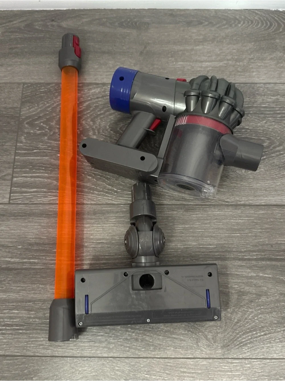 Dyson Kids Stick Vacuum Toy in Gray, Blue and Orange